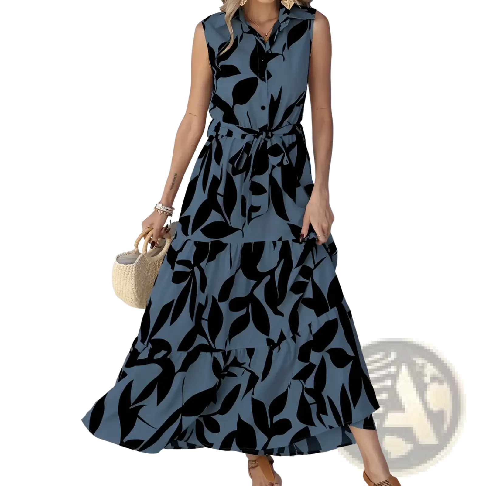 Elegant leaf print sleeveless tiered maxi dress in muted blue fabric with bold black leaf patterns