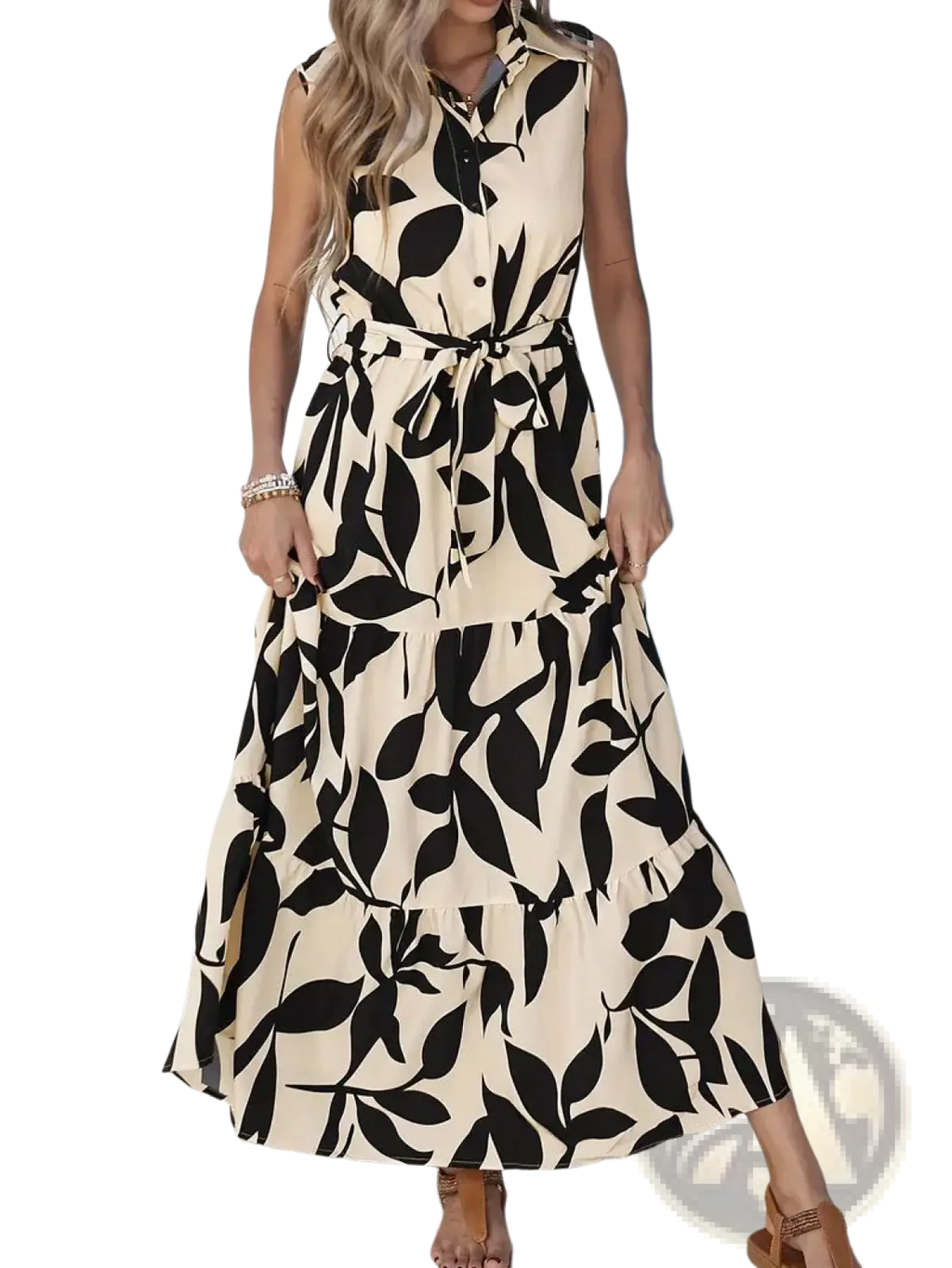 Elegant leaf print sleeveless maxi dress in cream with bold black leaf pattern and self-tie waistband