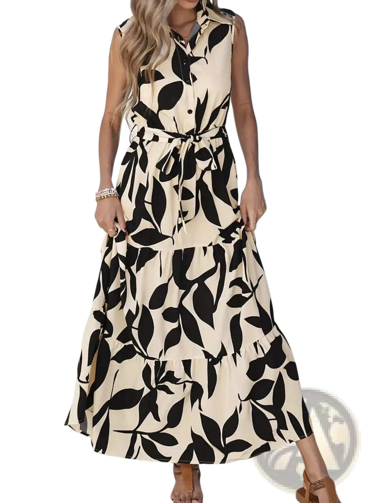 Elegant leaf print sleeveless maxi dress in cream with bold black leaf pattern and self-tie waistband