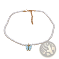 Elegant pearl choker necklace with a light blue butterfly pendant and gold-tone accents
