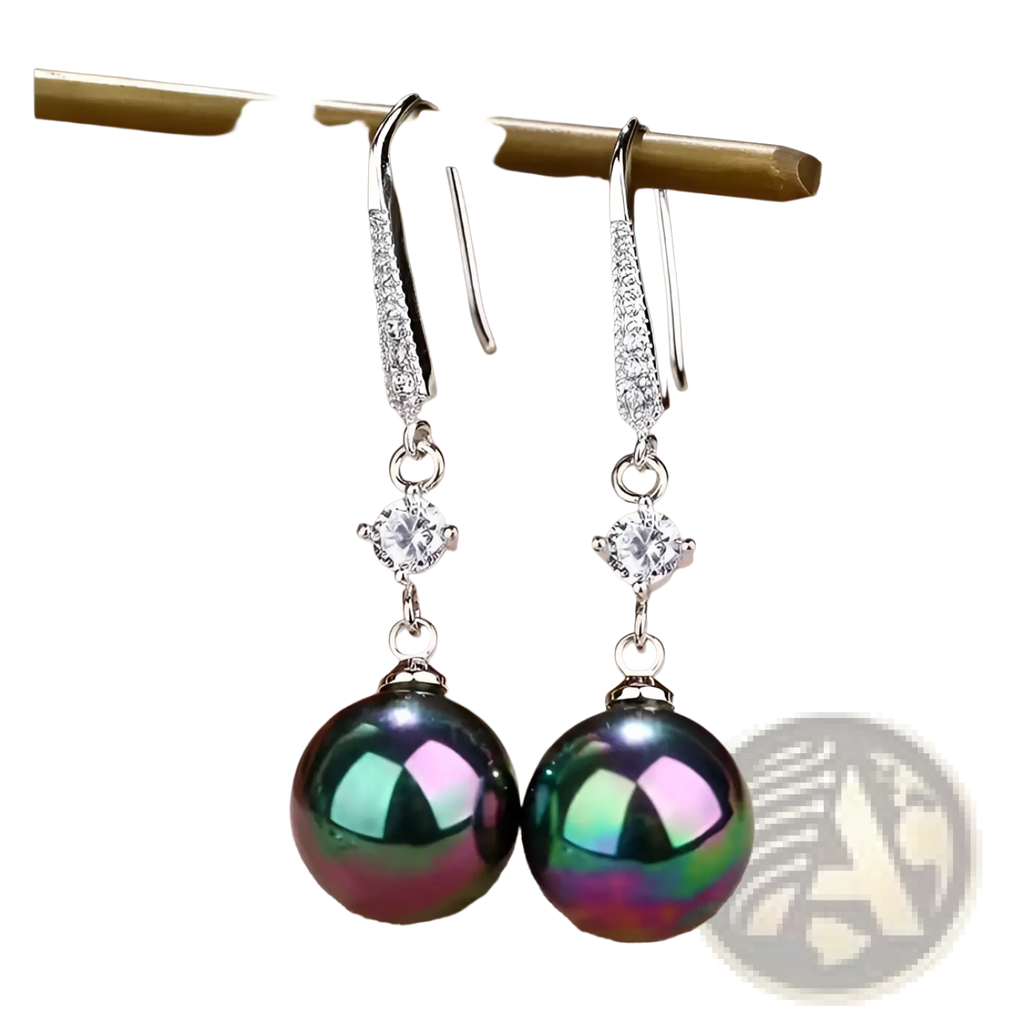 Elegant pearl and pave diamond drop earrings featuring silver dangle design with sparkling pave and peacock green pearls