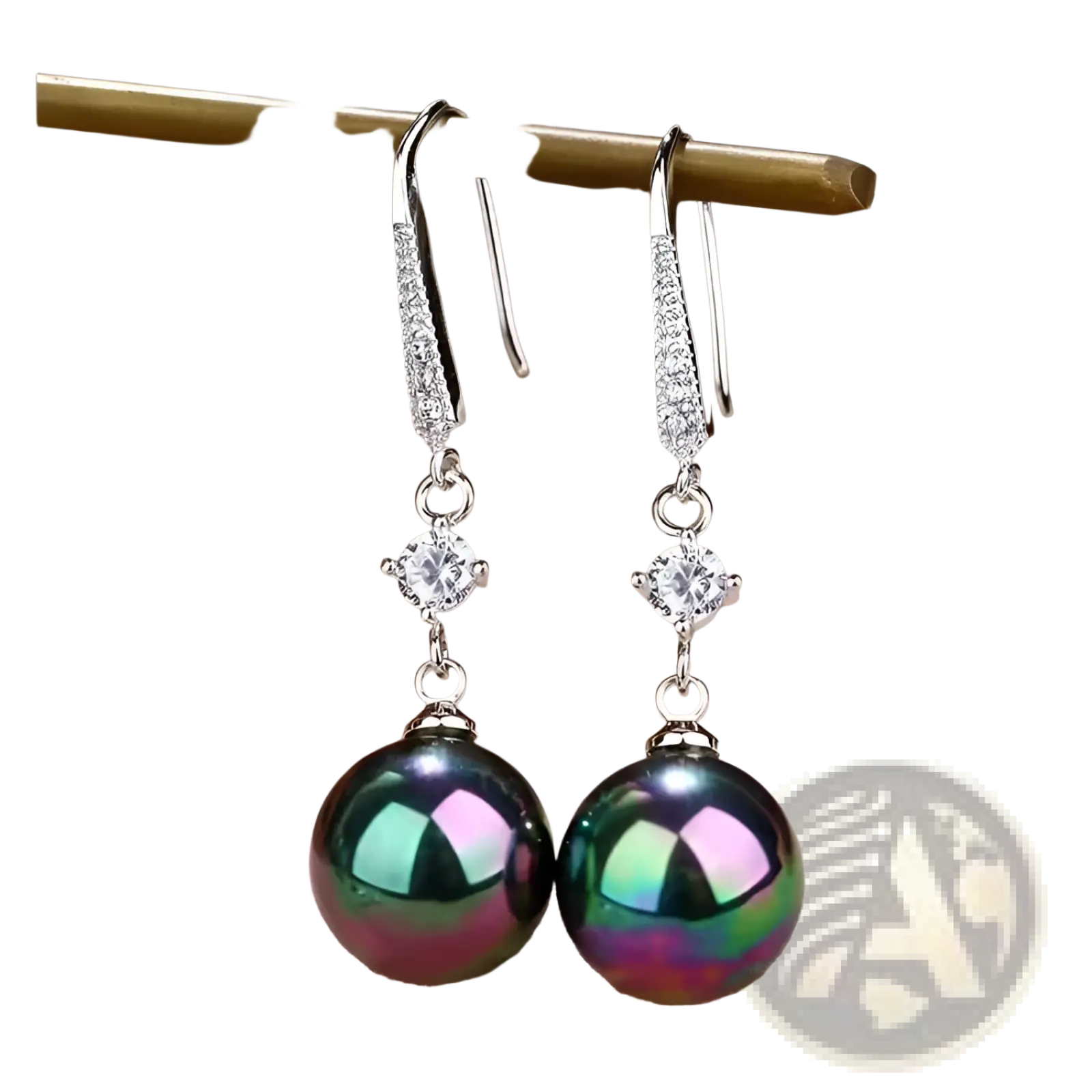Elegant pearl and pave diamond drop earrings featuring silver dangle design with sparkling pave and peacock green pearls