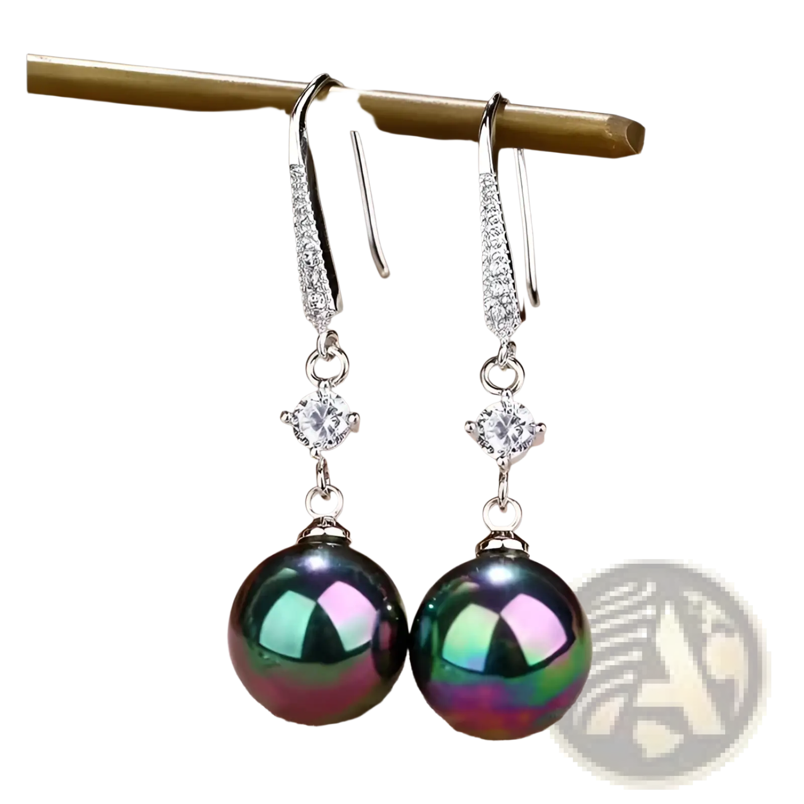 Elegant pearl and pave diamond drop earrings featuring silver hooks with sparkling diamonds and a peacock green pearl