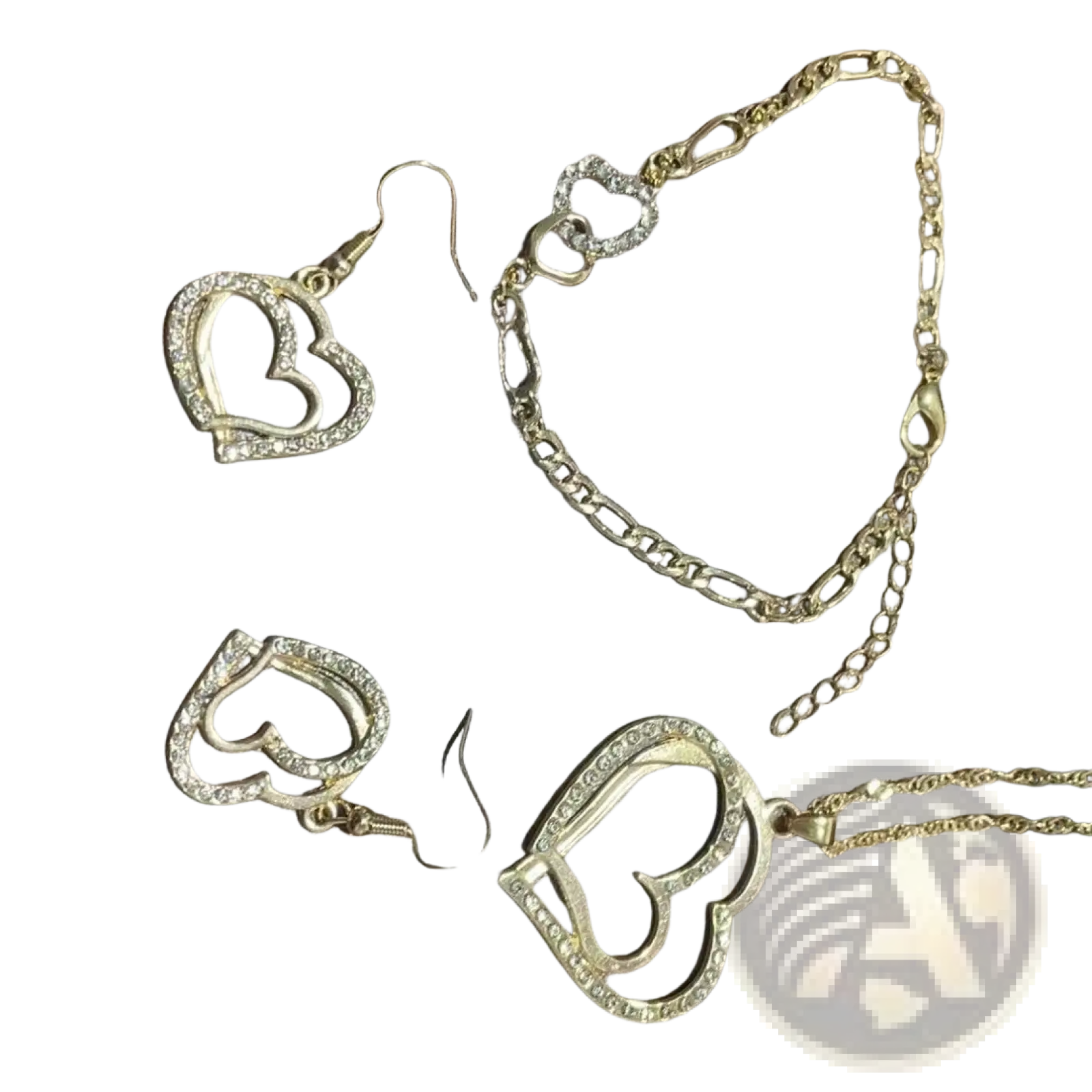 Gold-toned heart-shaped jewelry set with sparkling rhinestone accents on earrings bracelet and pendant elegant design