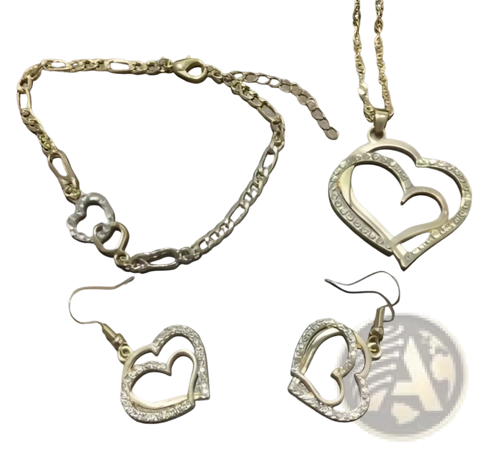 Gold-toned heart-themed jewelry set with bracelet necklace and earrings adorned with clear rhinestones
