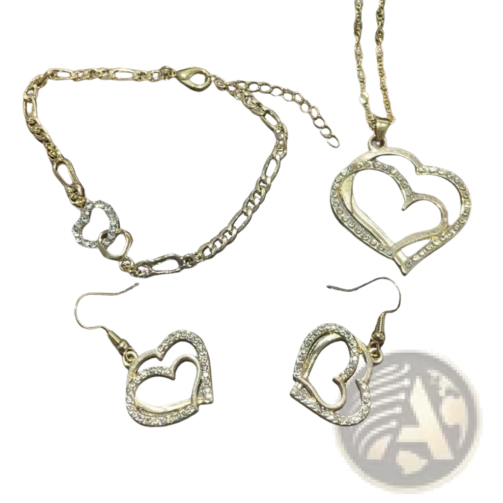Gold-toned heart-shaped jewelry set with necklace bracelet and earrings featuring sparkling rhinestone accents