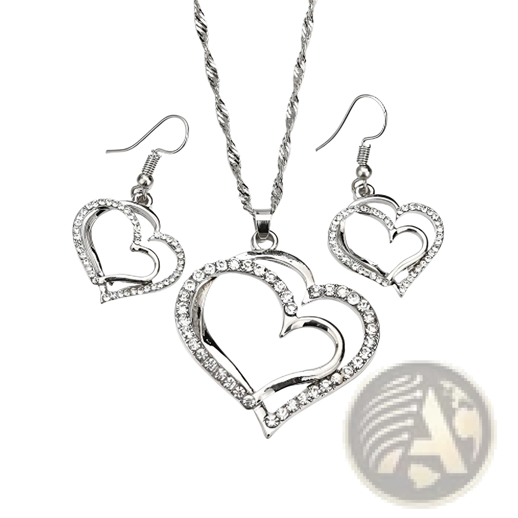 Elegant rhinestone heart jewelry set with silver intricate openwork design and sparkling rhinestone embellishments