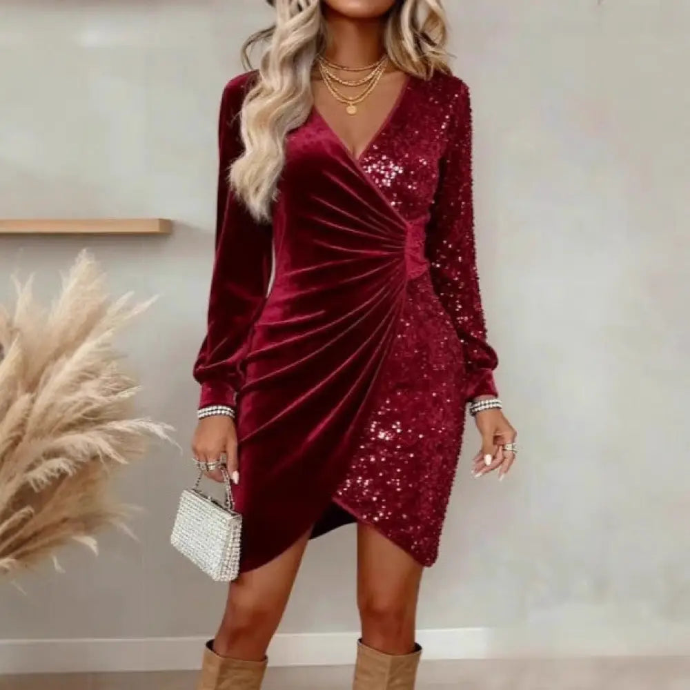 A burgundy velvet wrap dress with long sleeves sequined panel v neckline and asymmetrical hem for elegant occasions