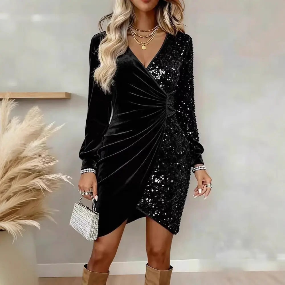 Black velvet long sleeve wrap dress with gold sequins and v neck detail for elegant evening wear