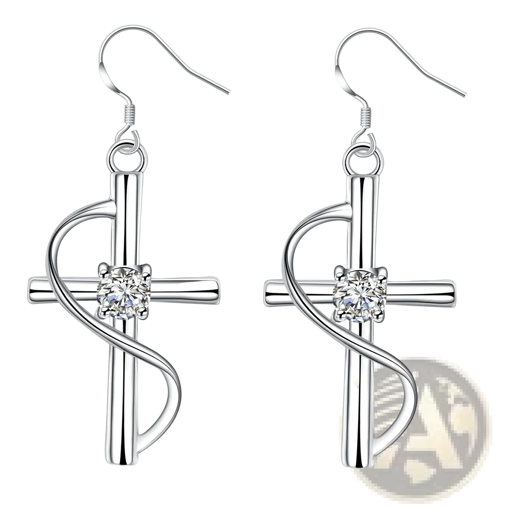 Elegant silver swirling cross earrings featuring a central clear gemstone in a refined design