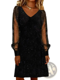 Black sparkly mini party dress with sheer long mesh sleeves and a v neckline showcasing elegant shimmer