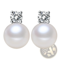 Elegant white pearl and cubic zirconia silver stud earrings featuring round lustrous pearls and clear stones