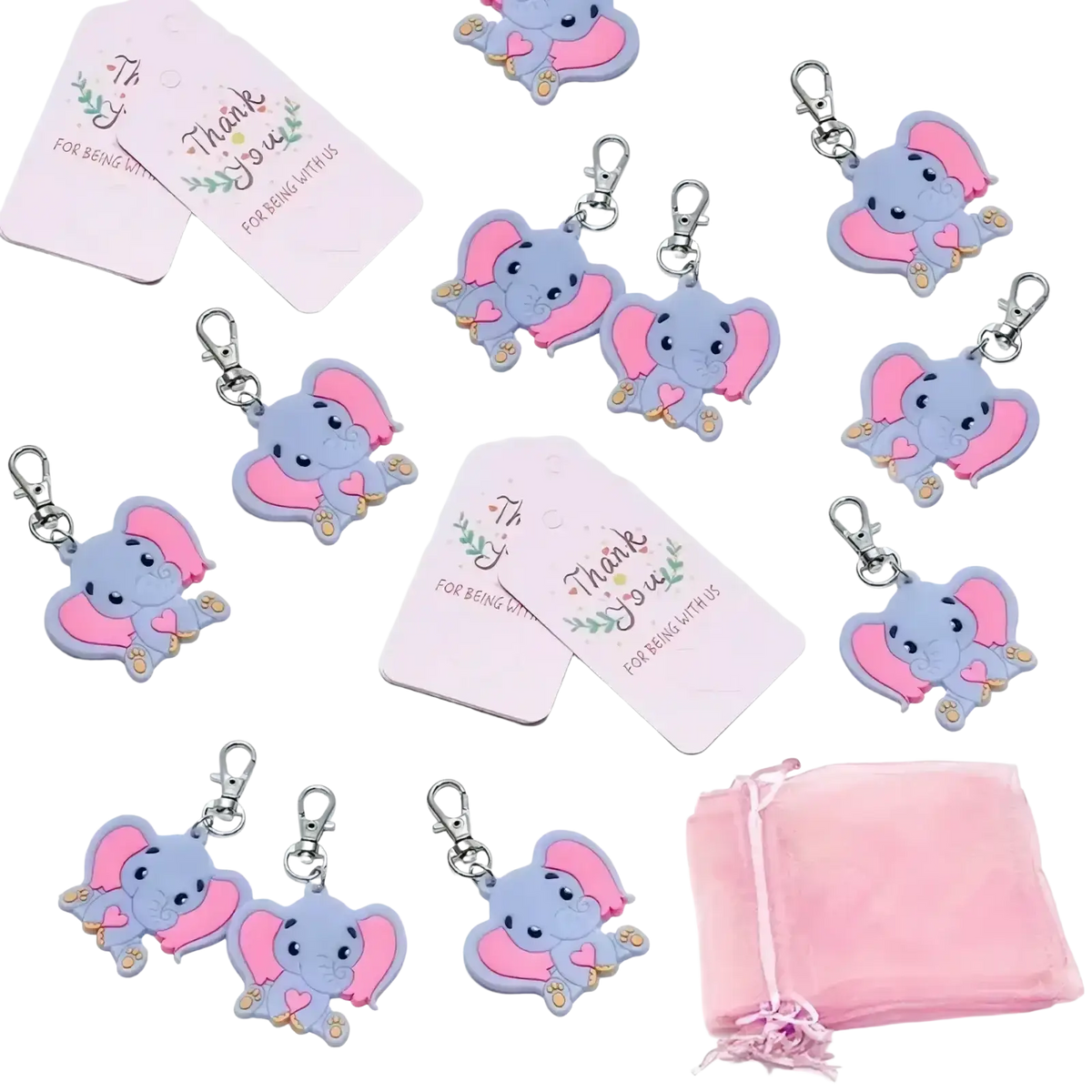 Elephant baby shower favors set of pink and light blue silicone keychains with pink ears gold accents and silver clasps
