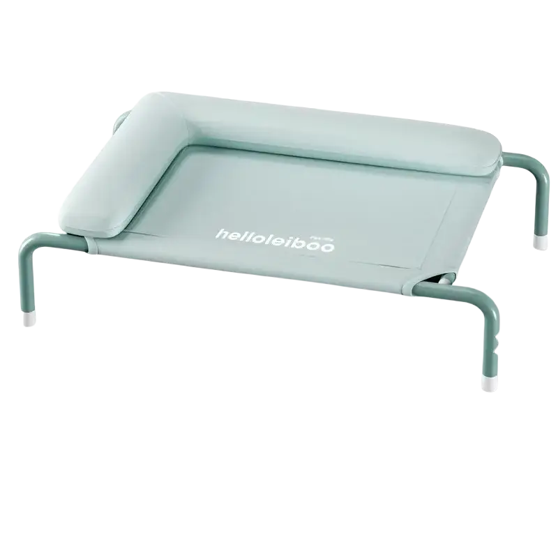 A mint green fabric elevated dog bed with padded headrest and metal frame by helloleiboo for comfort and support