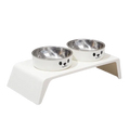 White cat-faced elevated dog feeder with raised stand and two stainless steel bowls for pet feeding