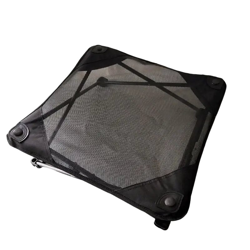 Elevated folding dog cot with black mesh fabric reinforced corners and metal legs for durable pet bed support