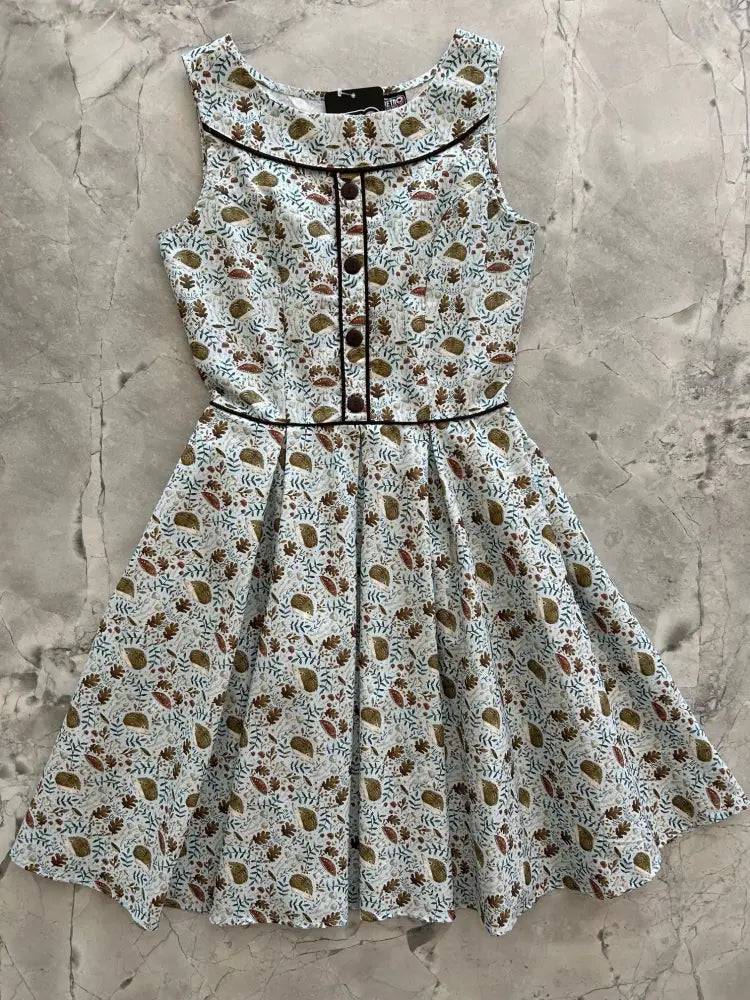 Elizabeth hedgehog print vintage cotton sleeveless white dress with playful hedgehog pattern and black trim details