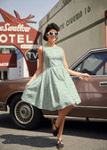Elizabeth petite floral cotton vintage flare dress in light green with sleeveless fitted bodice and flared skirt