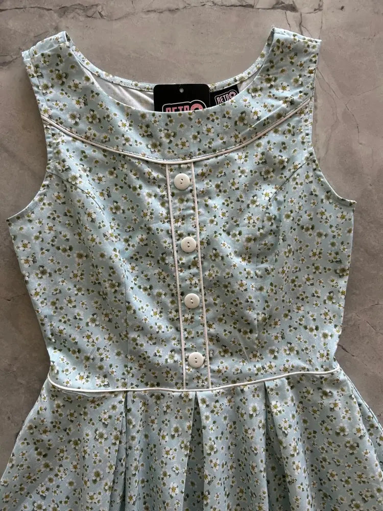 Elizabeth petite floral cotton vintage flare dress in light blue sleeveless design with delicate floral pattern and white buttons