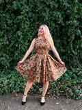 Elizabeth pomegranate floral cotton a line vintage dress in vibrant sleeveless design with red and green rose pattern on beige