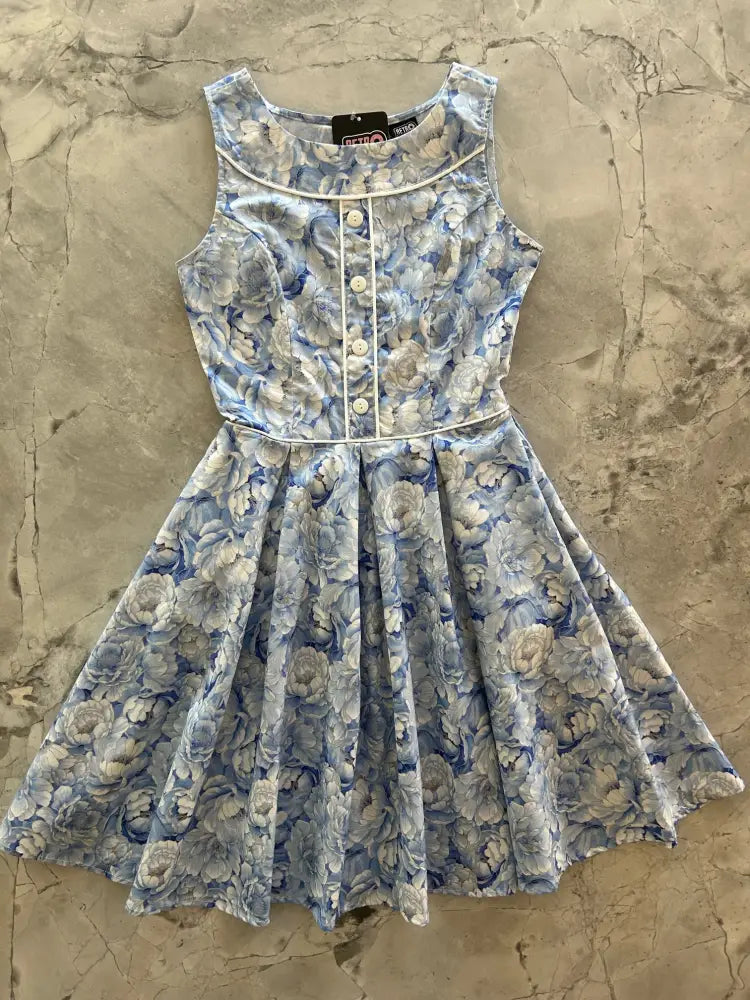 Elizabeth sky floral vintage cotton pleated dress sleeveless blue and white floral print with fitted bodice and button front