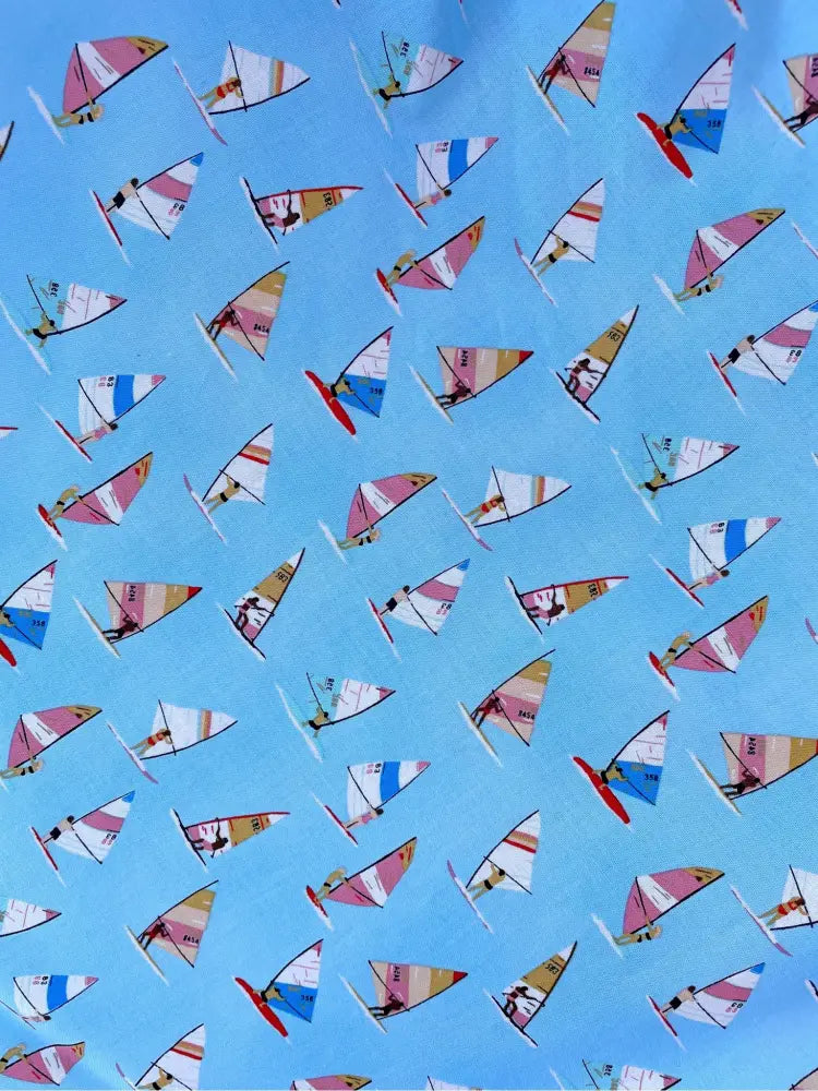 Elizabeth light blue vintage cotton a-line dress with colorful windsurfer sail pattern on blue fabric