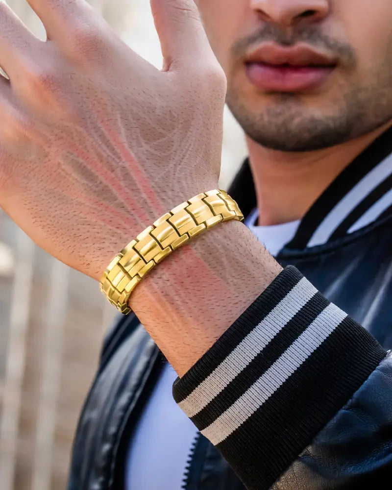 Ellipsemax gold titanium 5000 gauss magnetic bracelet gold-toned metal link with sleek interlocking design on wrist