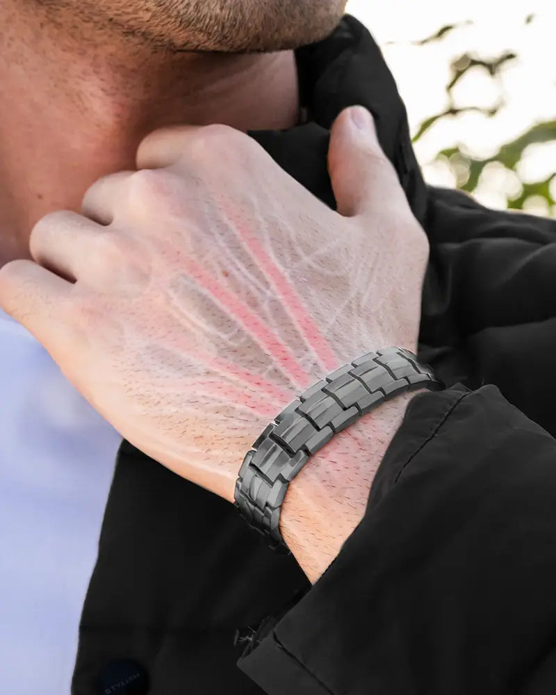 A sleek dark gray metallic Ellipsemax men’s gunmetal titanium magnetic bracelet with segmented interlocking design