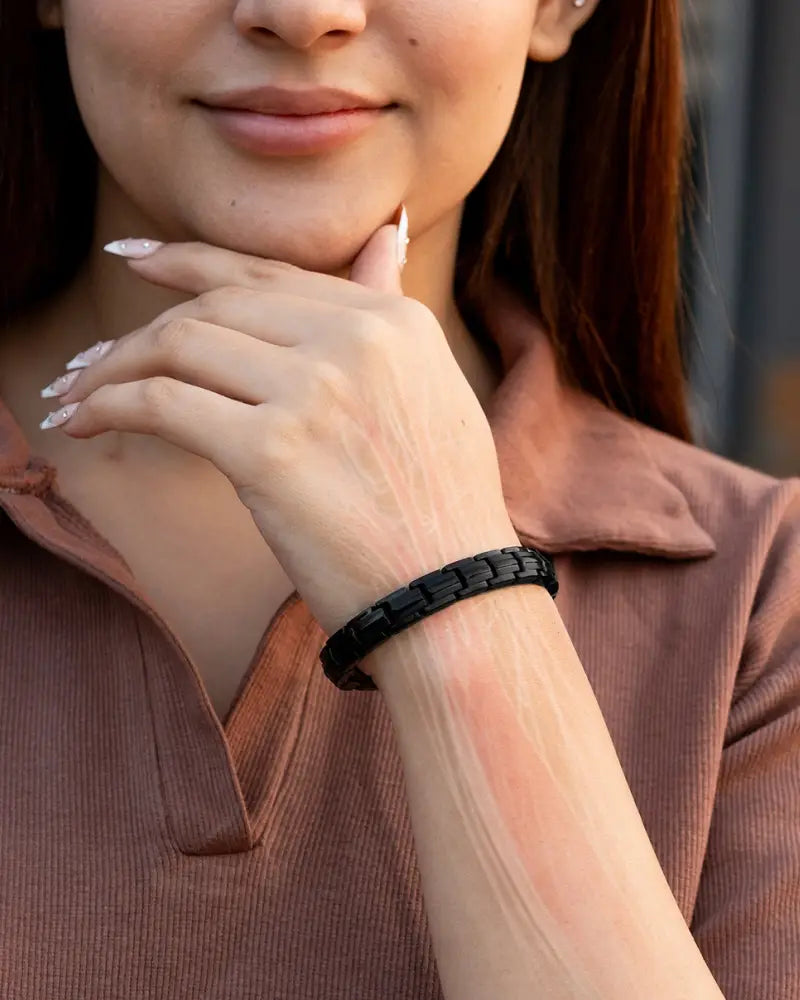 Ellipsemax black titanium magnetic link bracelet featuring a sleek interlocking link design