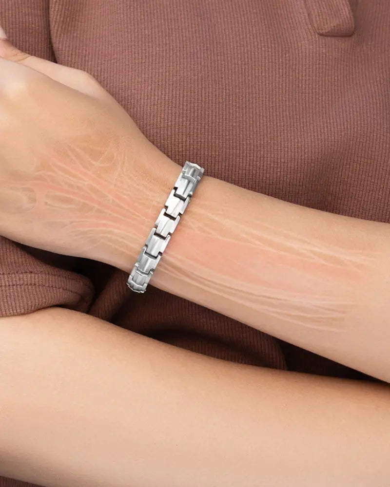 Ellipsemax silver magnetic titanium link bracelet for women with sleek modern interlocking design worn on wrist