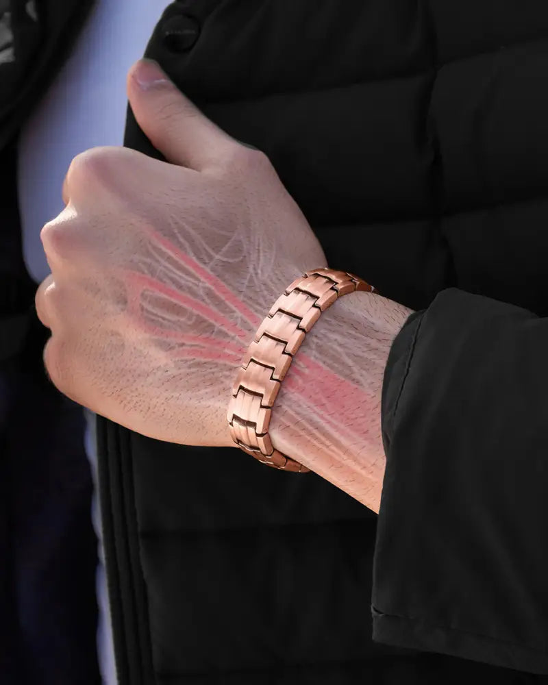 Ellipsemax rose gold pure copper magnetic link bracelet with interlocking metal design worn on a wrist
