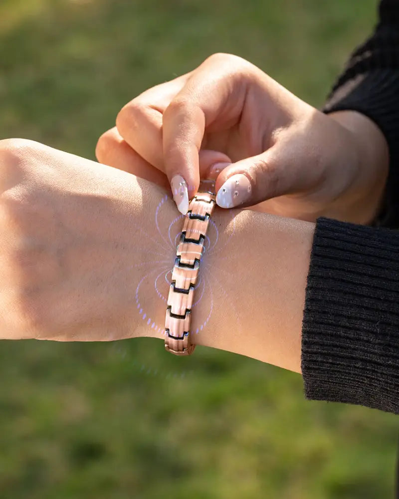 Ellipsemax magnetic rose gold copper therapy bracelet with interlocking rectangular links and black accent edges