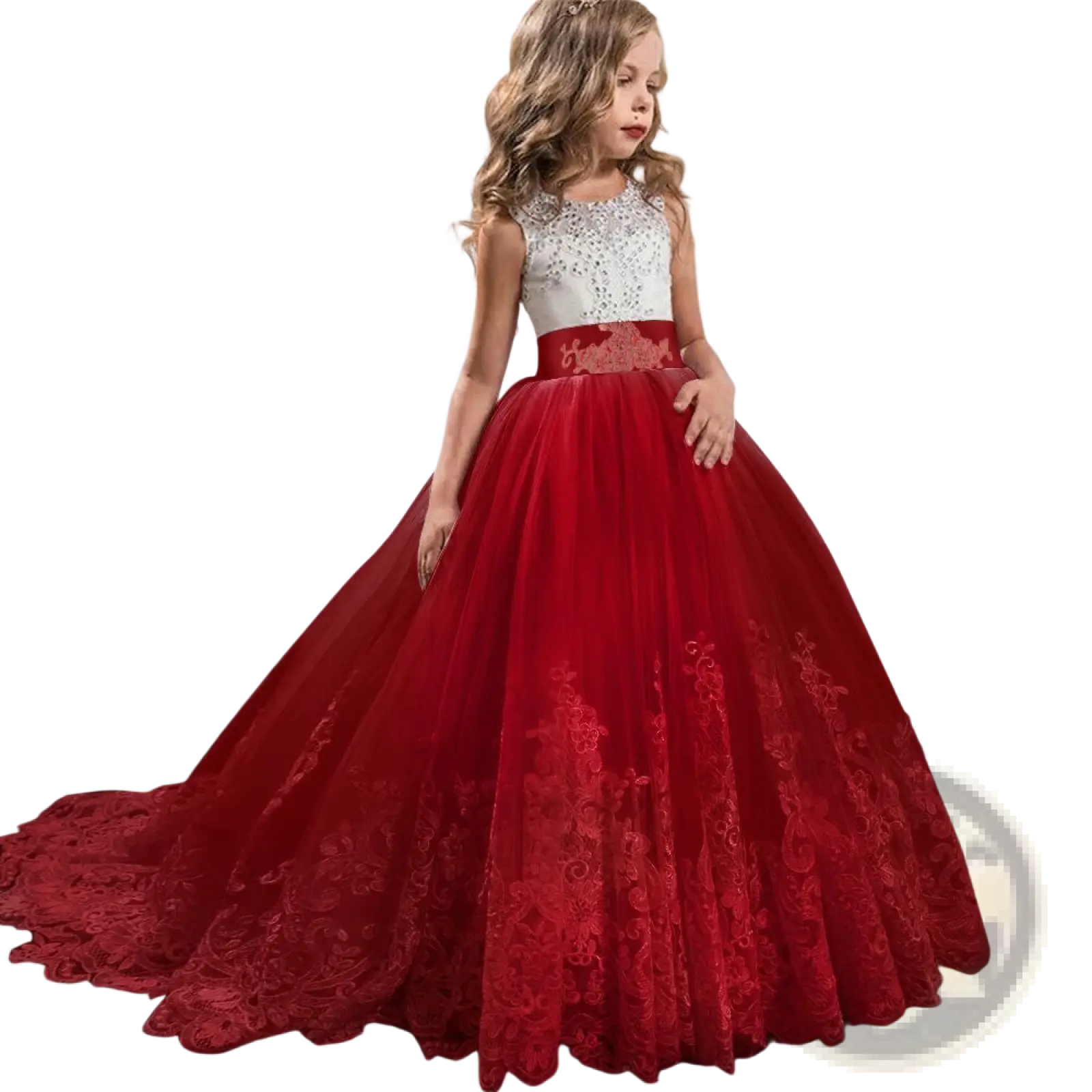 A young girl wearing a red and white embellished lace tulle flower girl princess gown with an embroidered belt