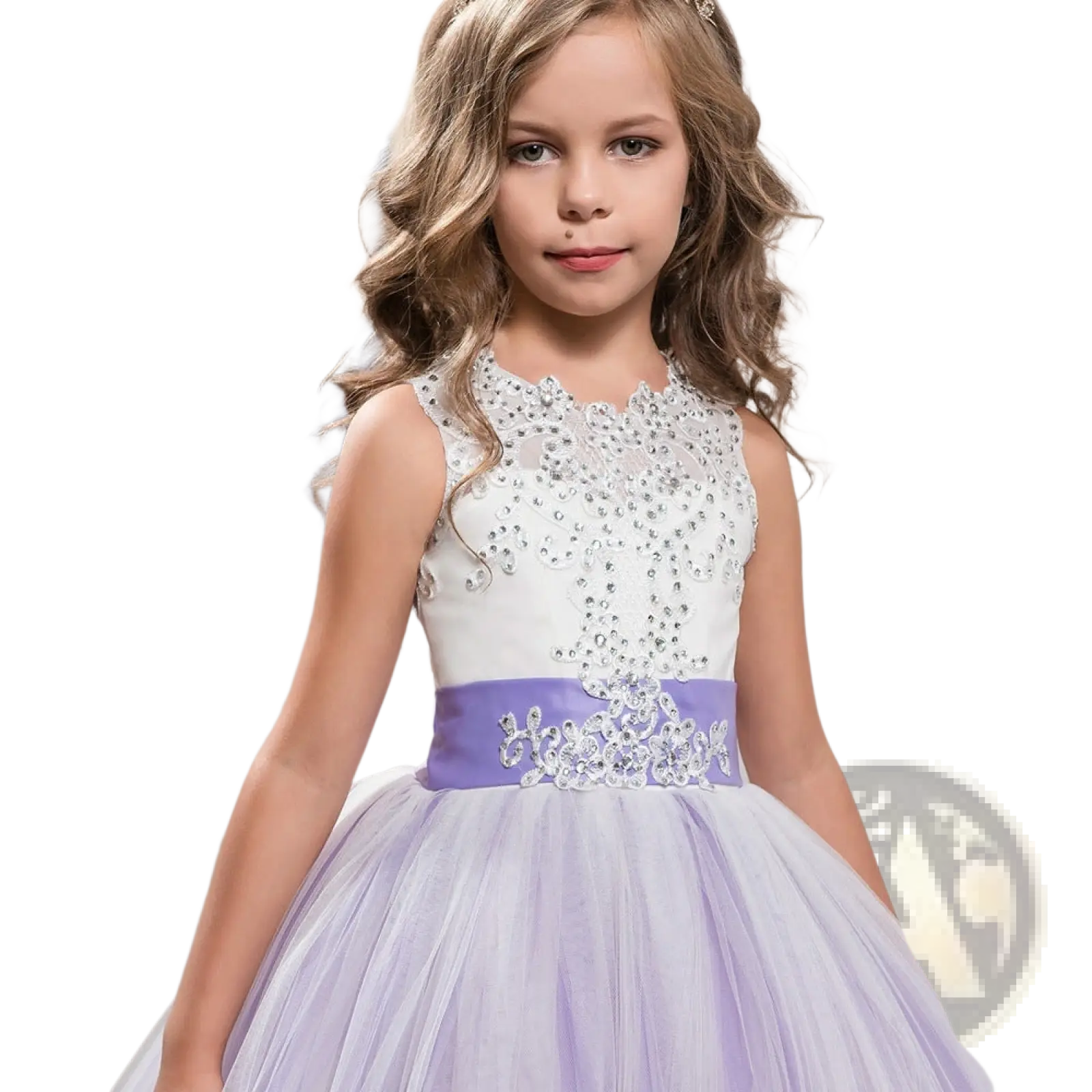 A young girl wears an embellished lace tulle flower girl princess gown in lavender with crystal-encrusted sash
