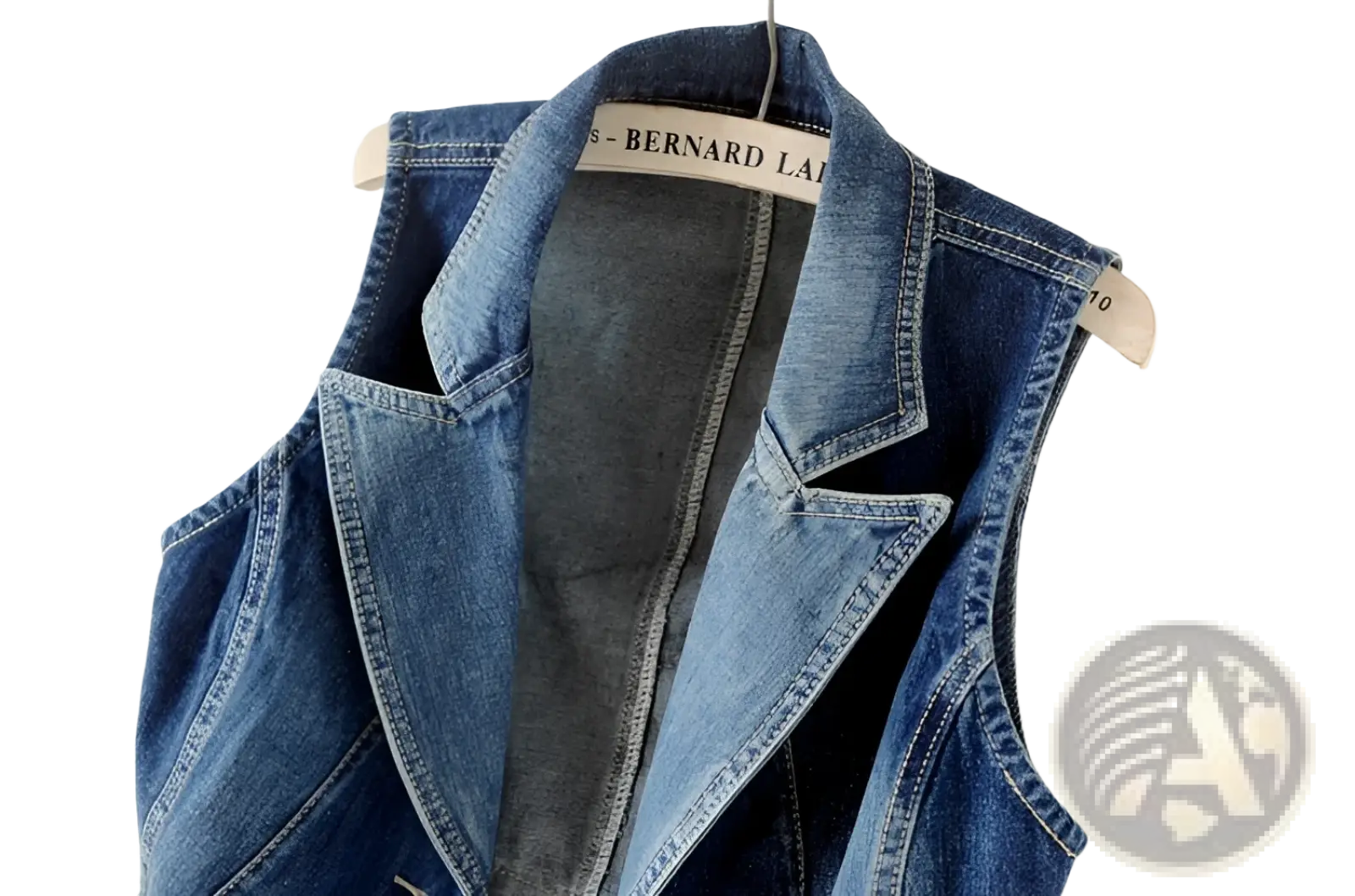 Blue denim vest with tailored collar front pockets gray inner lining and embellished heart charm zipper detail