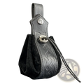 Black leather embossed celtic knot viking sling bag with silver-toned toggle closure and skull clasp