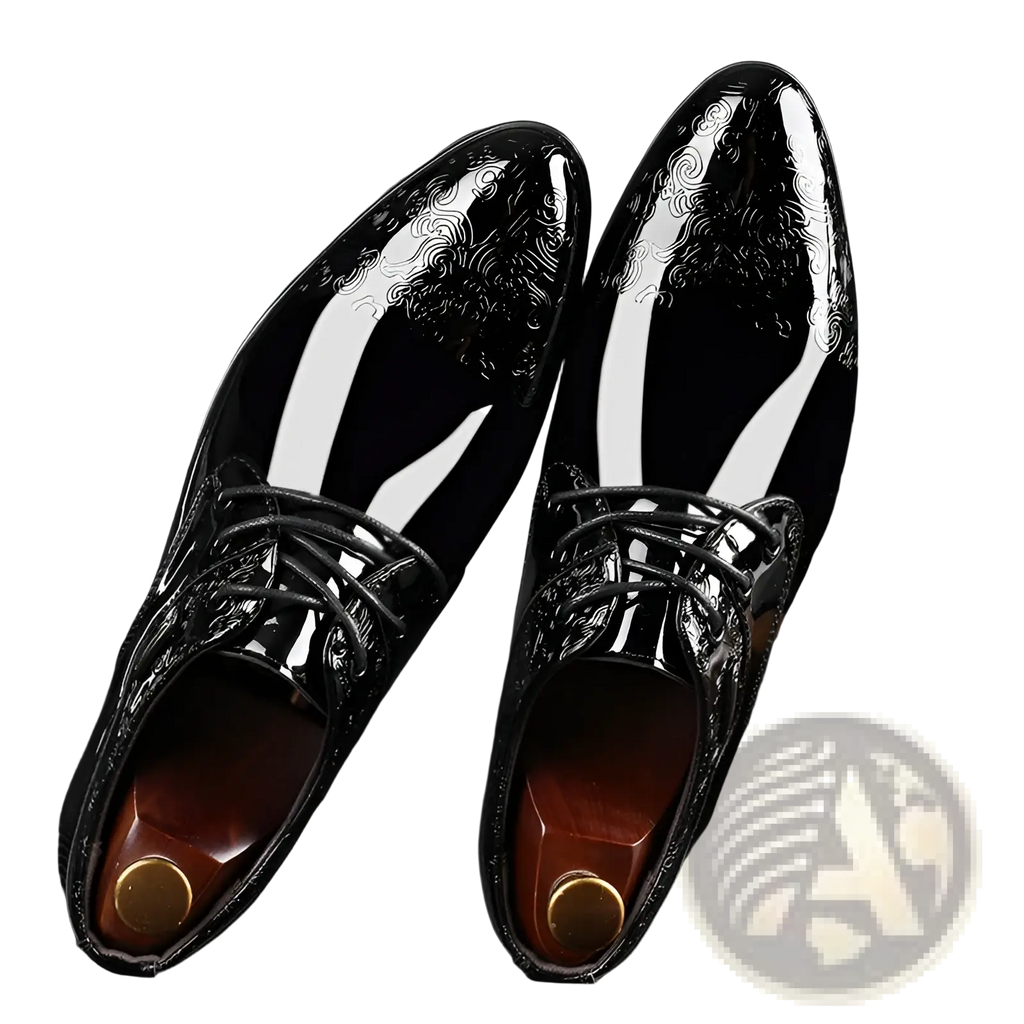 Embossed patent leather men’s formal business shoes in black with a glossy finish and intricate white swirl toe patterns