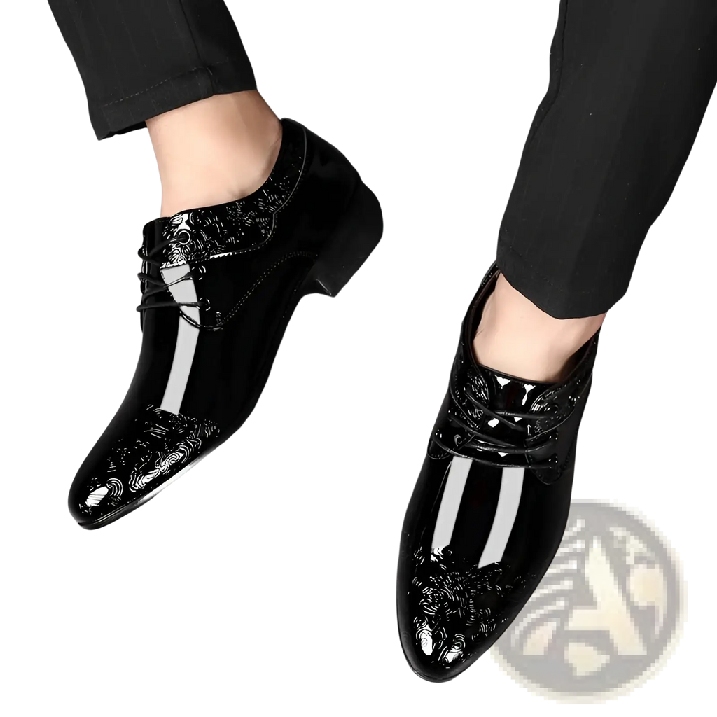 Embossed patent leather men’s formal business shoes in black with glossy finish and floral embroidery on the toe cap