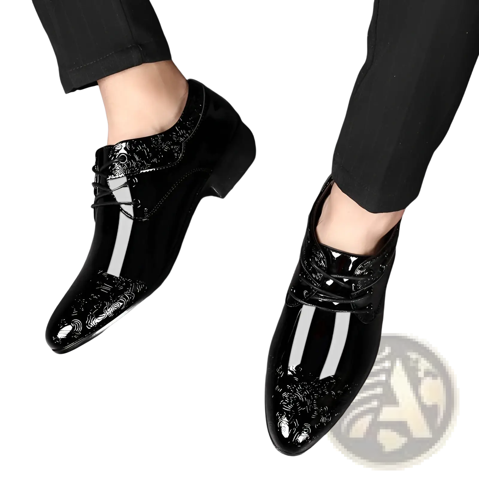 Embossed patent leather men’s formal business shoes in black with glossy finish and floral embroidery on the toe cap