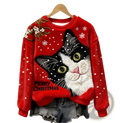 Red embroidered animal Christmas crewneck sweater featuring a black and white cat with green eyes and festive embellishments