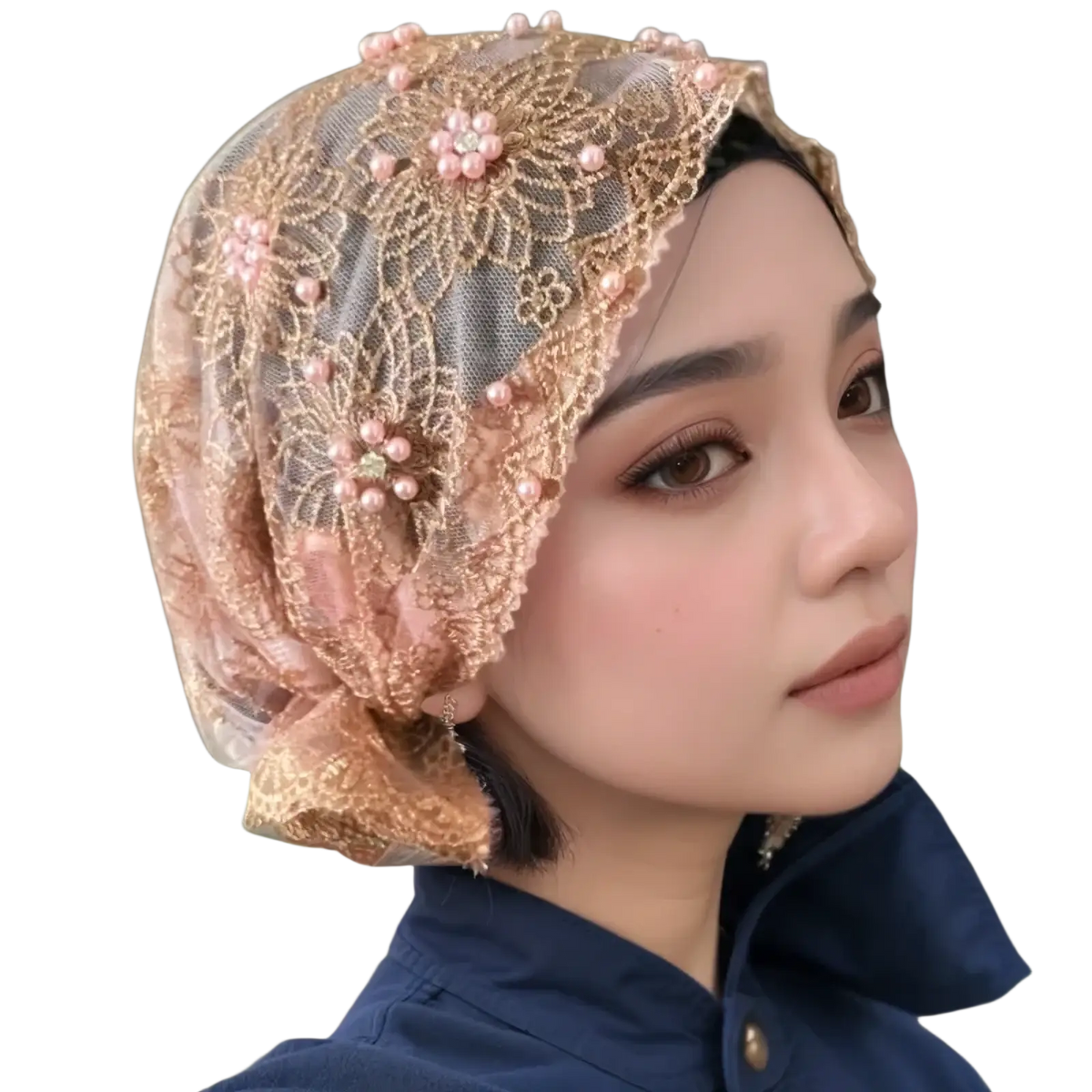 A delicate peach-colored embroidered beaded lace hijab hat with floral embroidery and pearl embellishments