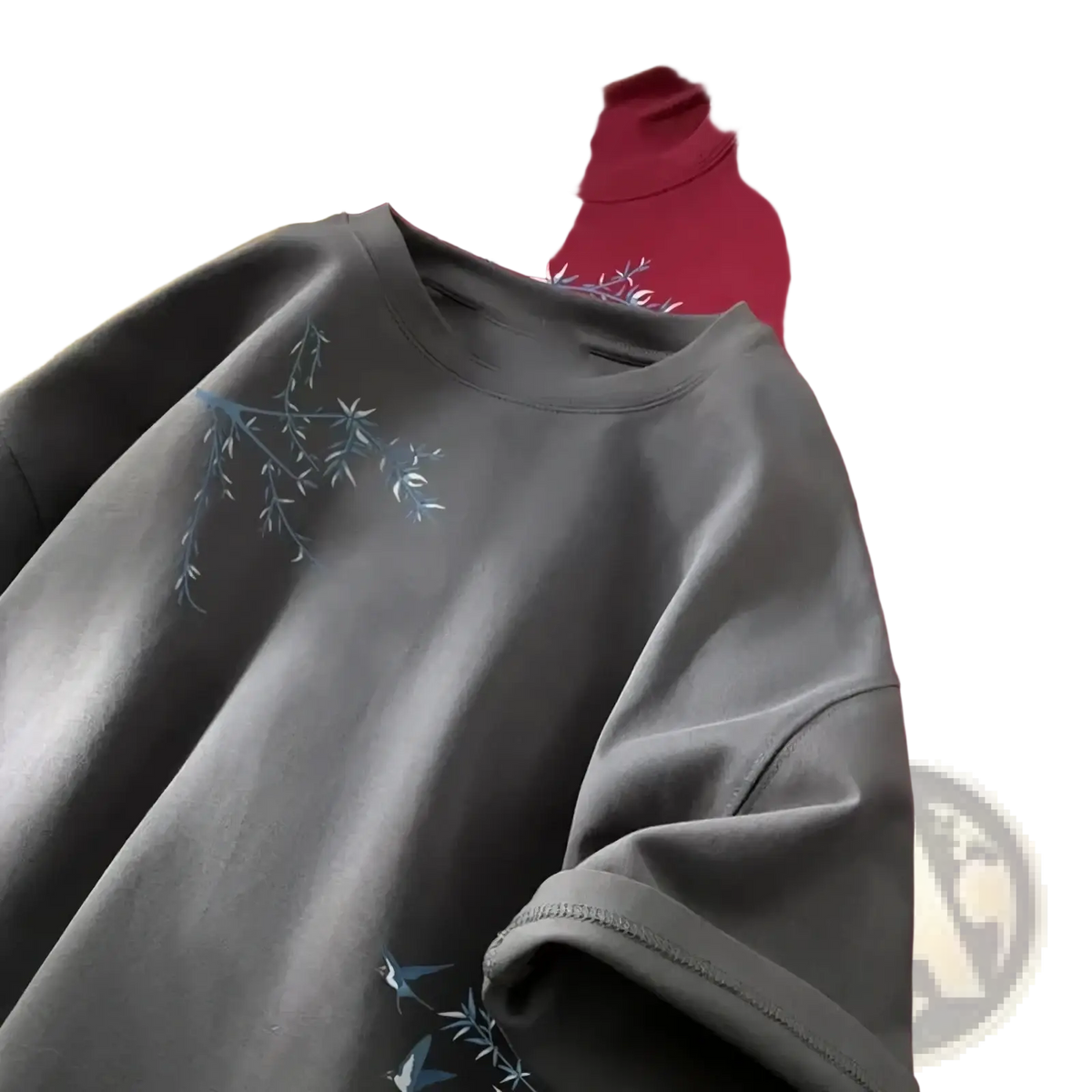 Gray cotton oversized t-shirt featuring delicate blue embroidered branches and birds on the front