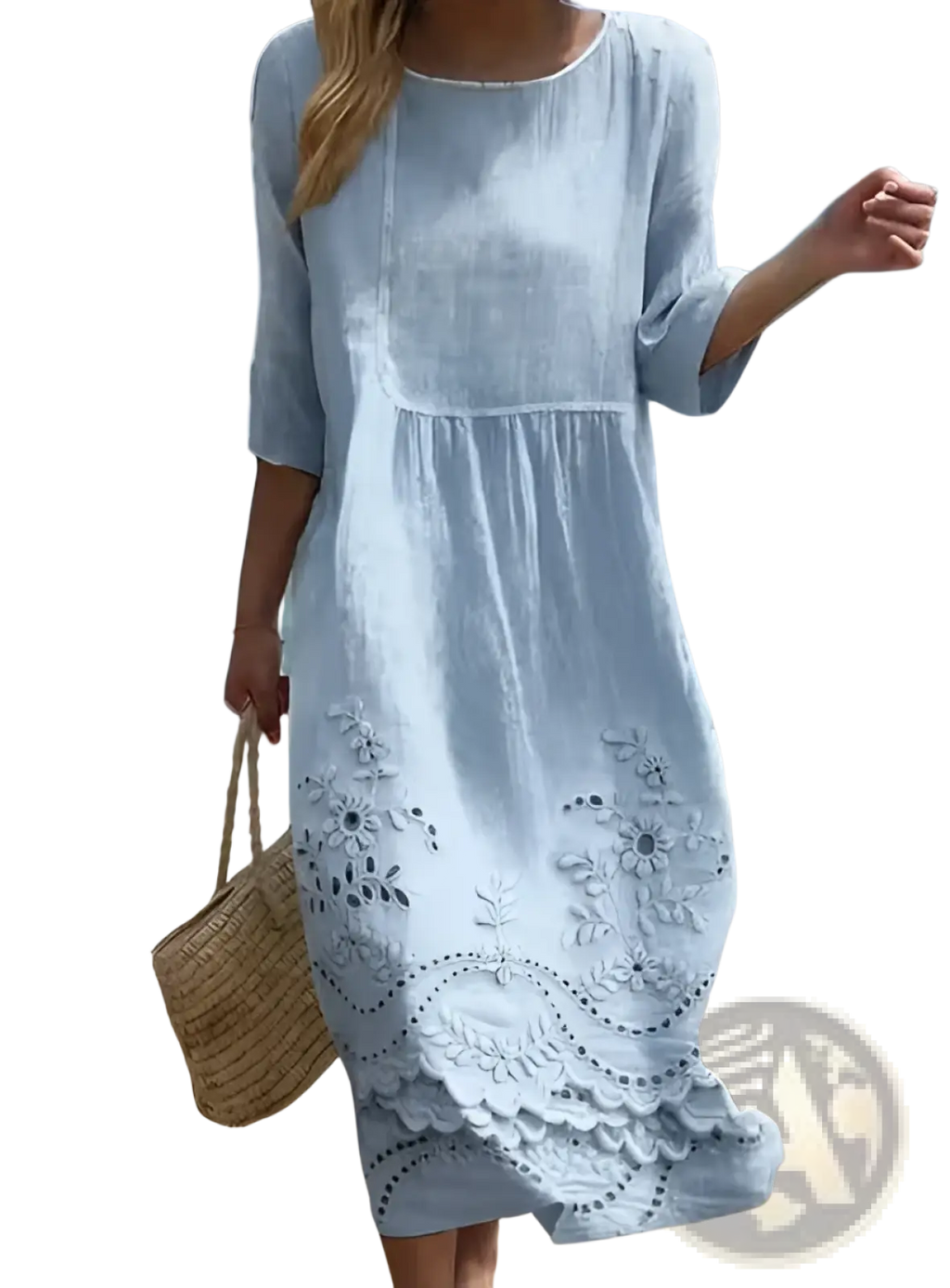 A light blue embroidered blue linen floral scalloped umbrella dress with delicate white floral embroidery and flowing fabric