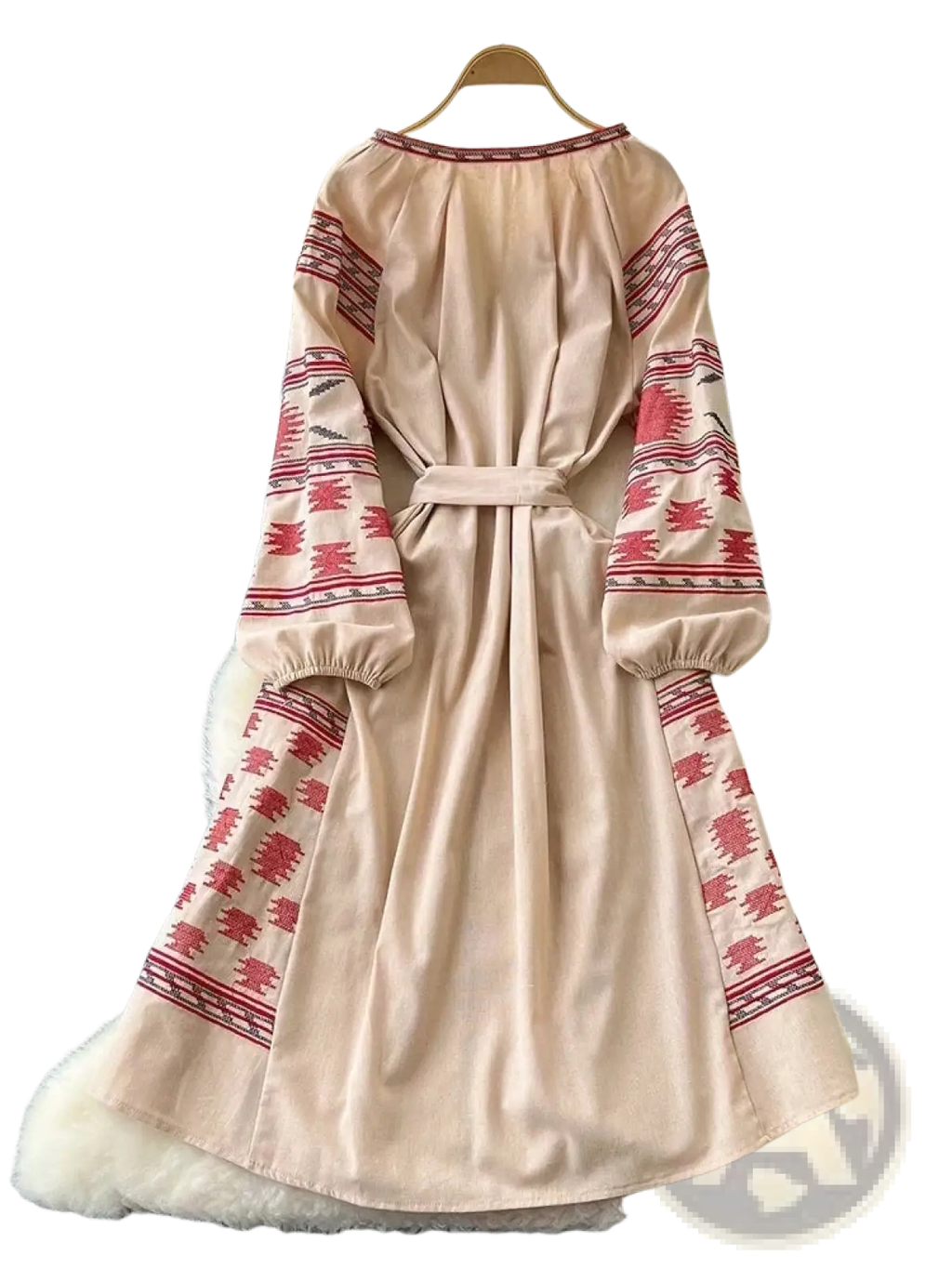 Beige long sleeve boho midi dress with red geometric embroidery and belted waist in an a-line silhouette