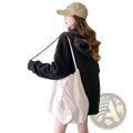 Off-white canvas tote bag with adjustable shoulder strap and drawstring closure paired with embroidered bunny zip up hoodie