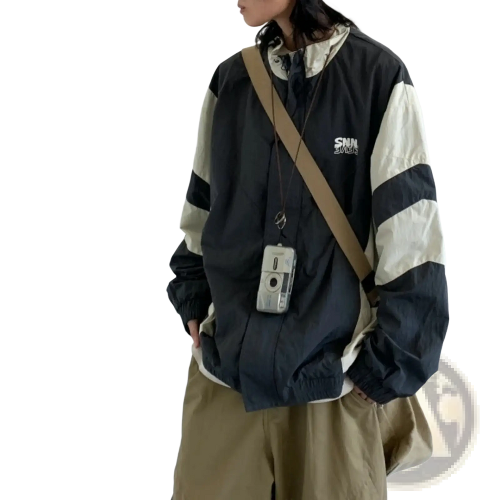 Black and cream color-blocked loose windbreaker jacket with embroidered logo on chest for casual wear