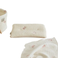 Cream-colored quilted embroidered cotton baby pillow with soft pink bunny appliqués for infant comfort