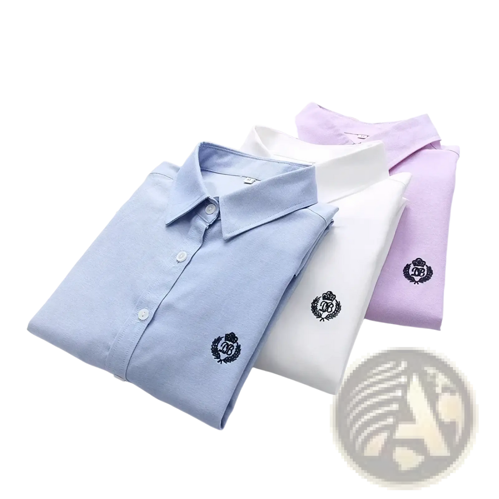 Embroidered cotton casual long sleeve blouse tops in light blue white and lavender with black crest logos on the chest