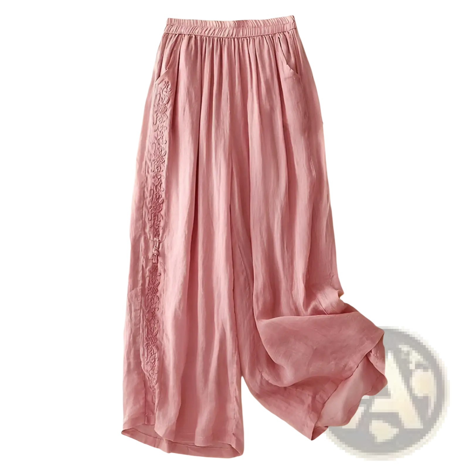 Soft pink embroidered cotton linen wide leg pants with delicate floral embroidery along the side seam