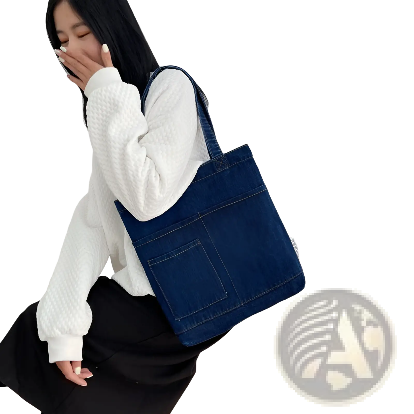 Blue denim tote bag with embroidered slogan front pocket and soft sturdy handles for everyday use